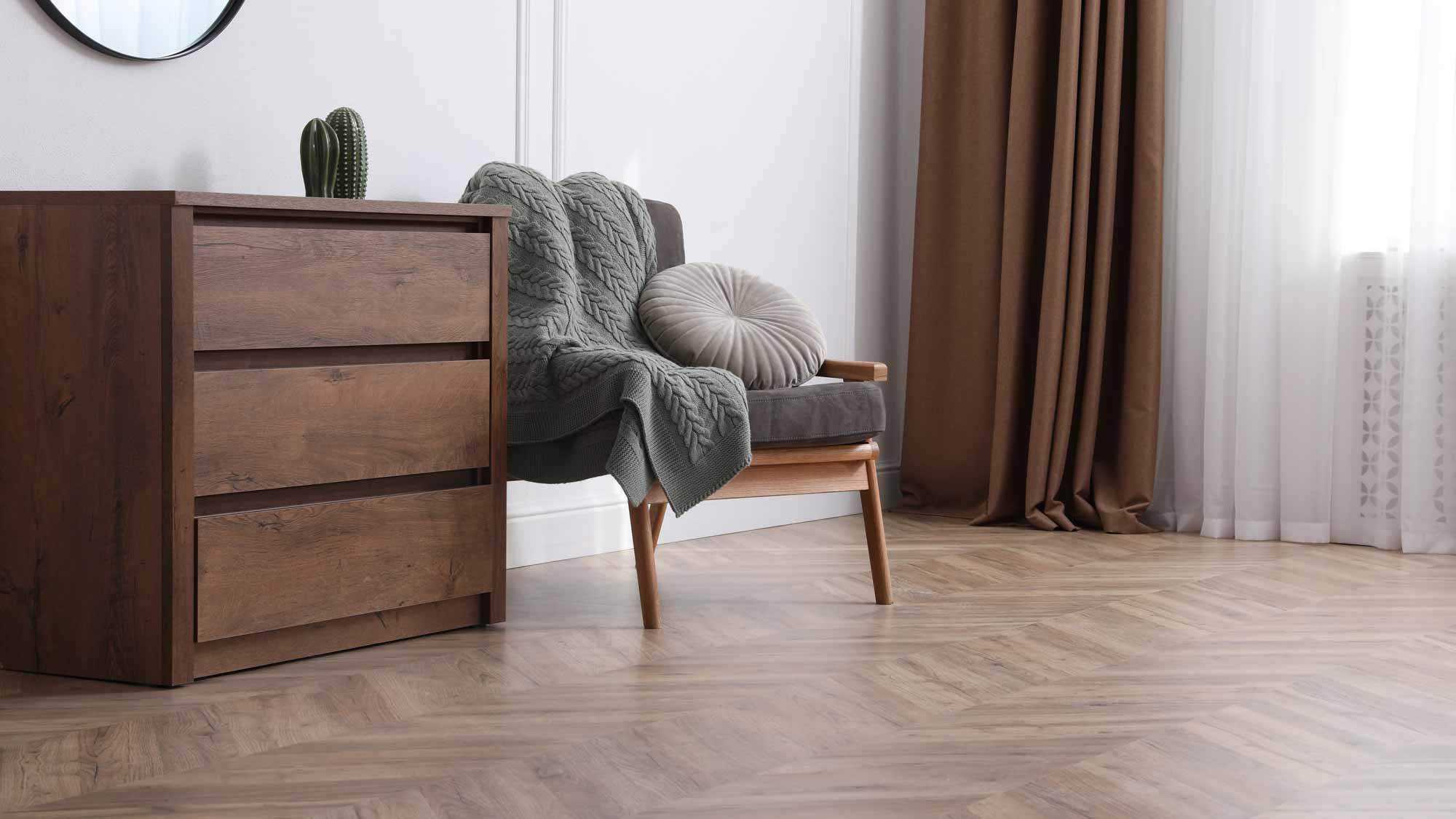Freshly refinished hardwood floor in a bedroom