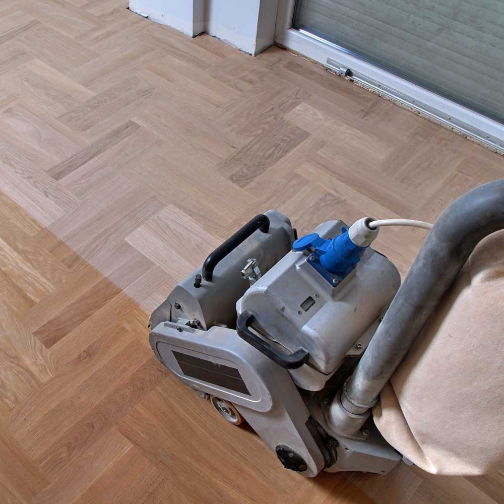 Sanding a hardwood floor down to bare wood